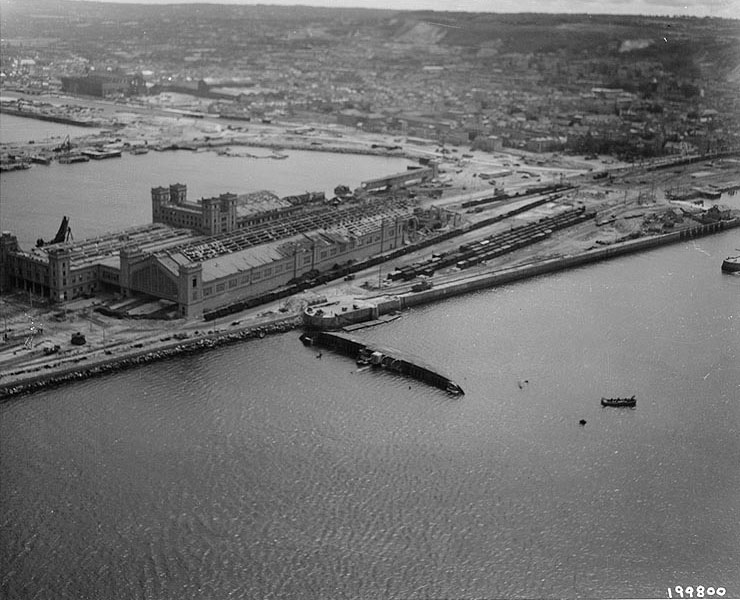 View of the railway ferry terminal in Cherbourg harbor, 29 Jul 1944