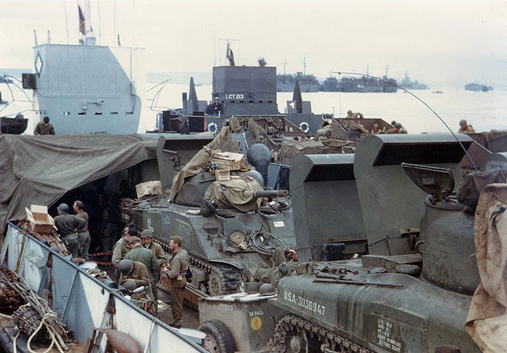 US Army M4 Sherman tanks and other equipment loaded in a LCT, ready for the invasion of France, circa late May or early Jun 1944