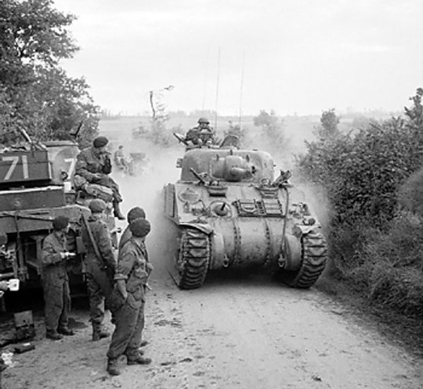 British Sherman tanks near Lebisey Wood for the assault on Caen, France, 8 Jul 1944