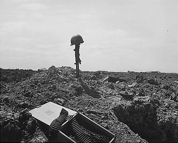 A makeshift monument to a fallen American soldier at Normandy, France, Jun 1944