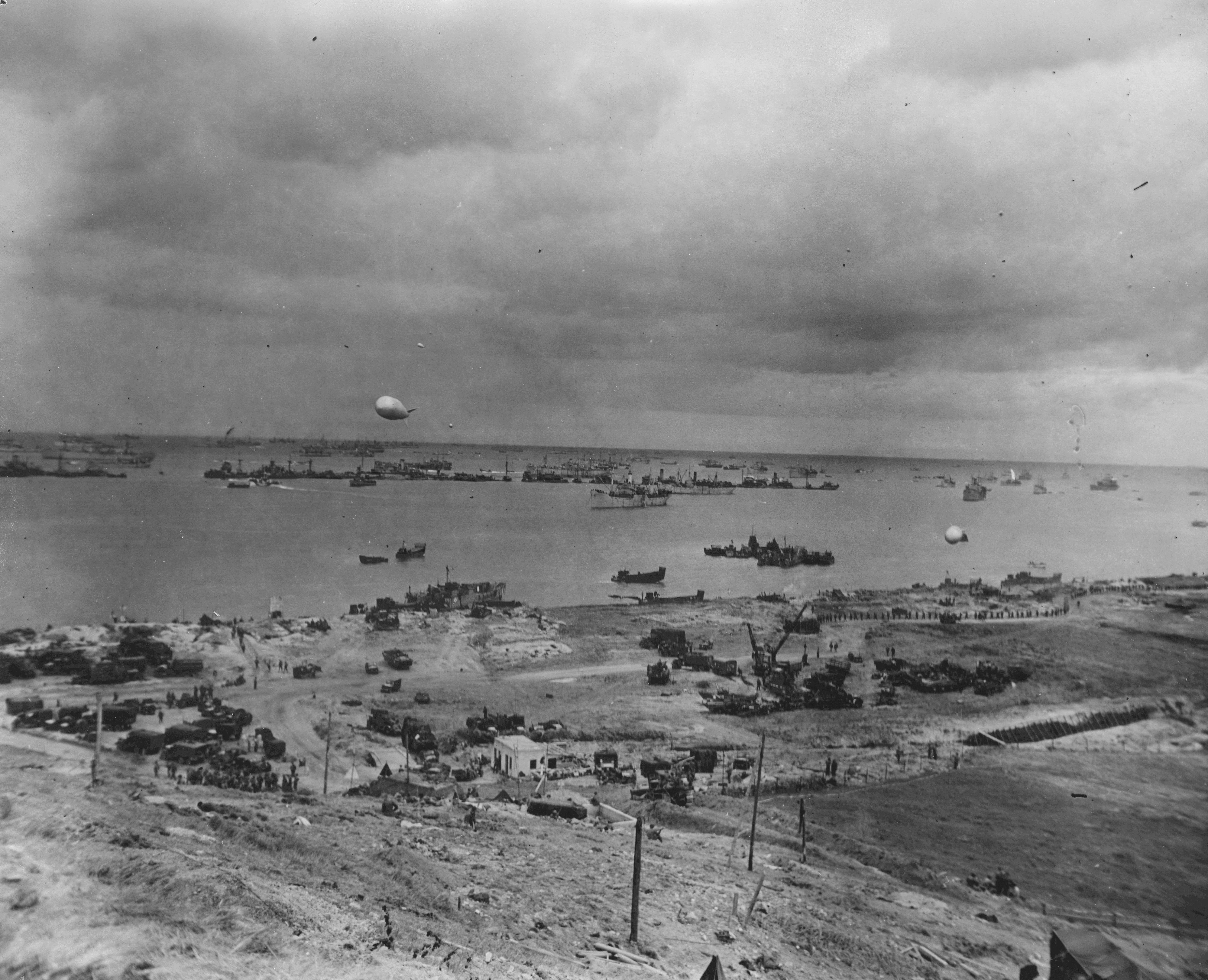 The 'Gooseberry' line of the 'Mulberry' artificial harbor off Omaha Beach, Normandy, France, Jun 1944