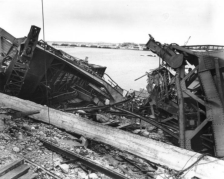 Two waterfront gantry cranes that were destroyed by the Germans during their demolition of Cherbourg's harbor facilities, 17 Jul 1944