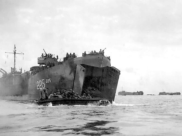 Amphibious tractor coming out of LST-225, delivering the first wave of landers on Peleliu, Palau Islands, 15 Sep 1944