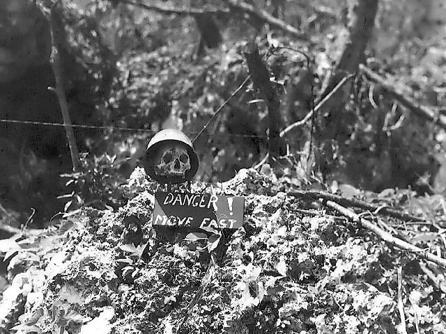 Skull and danger sign in combat area, Pelelu, Palau Islands, Oct 1944