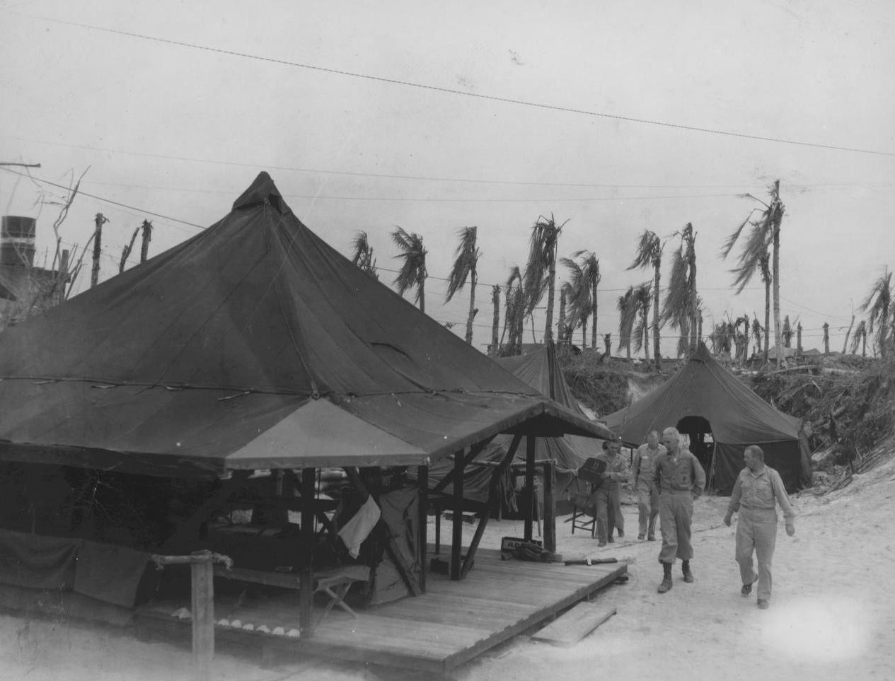 Oliver P. Smith walking through his Assistant Division Commander quarters on Peleliu, Palau Islands, 1944