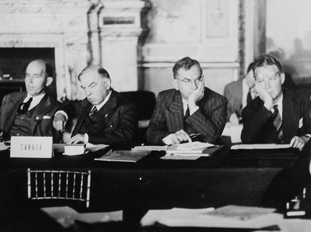 Norman Robertson, Mackenzie King, Brooke Claxton, and Arnold Heeney at the Paris Peace Conference, Palais du Luxembourg, Paris, France, Aug 1946