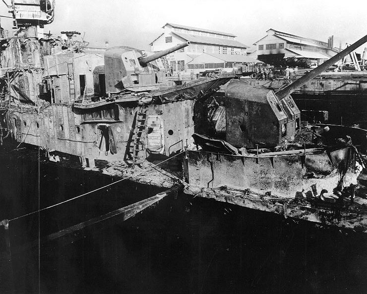 Starboard bow view of destroyer Downes, burned out in Pearl Harbor Navy Yard's Drydock Number One, 7 Dec 1941