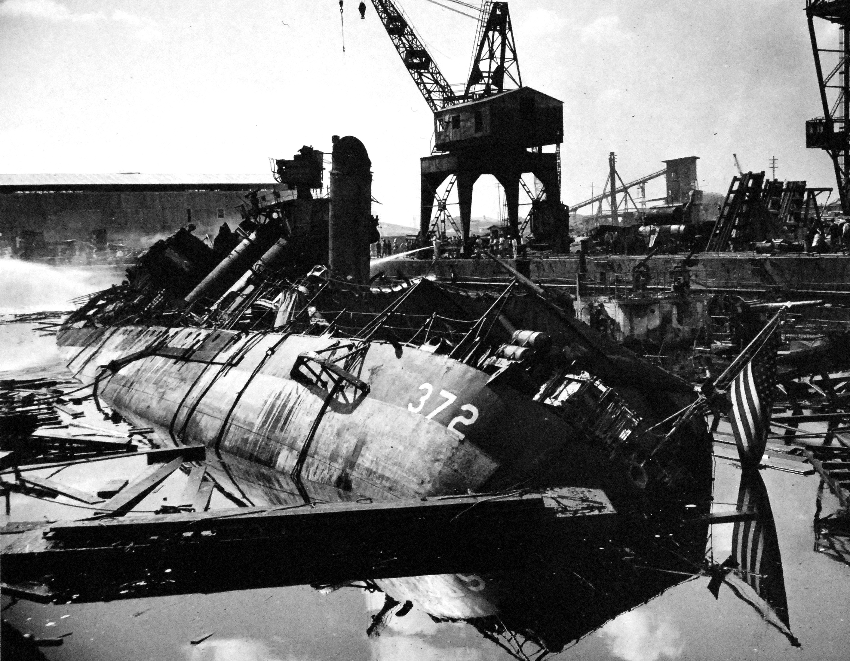 Wrecks of destroyers Downes and Cassin in Drydock One at Pearl Harbor Navy Yard, 7 Dec 1941, photo 5 of 5