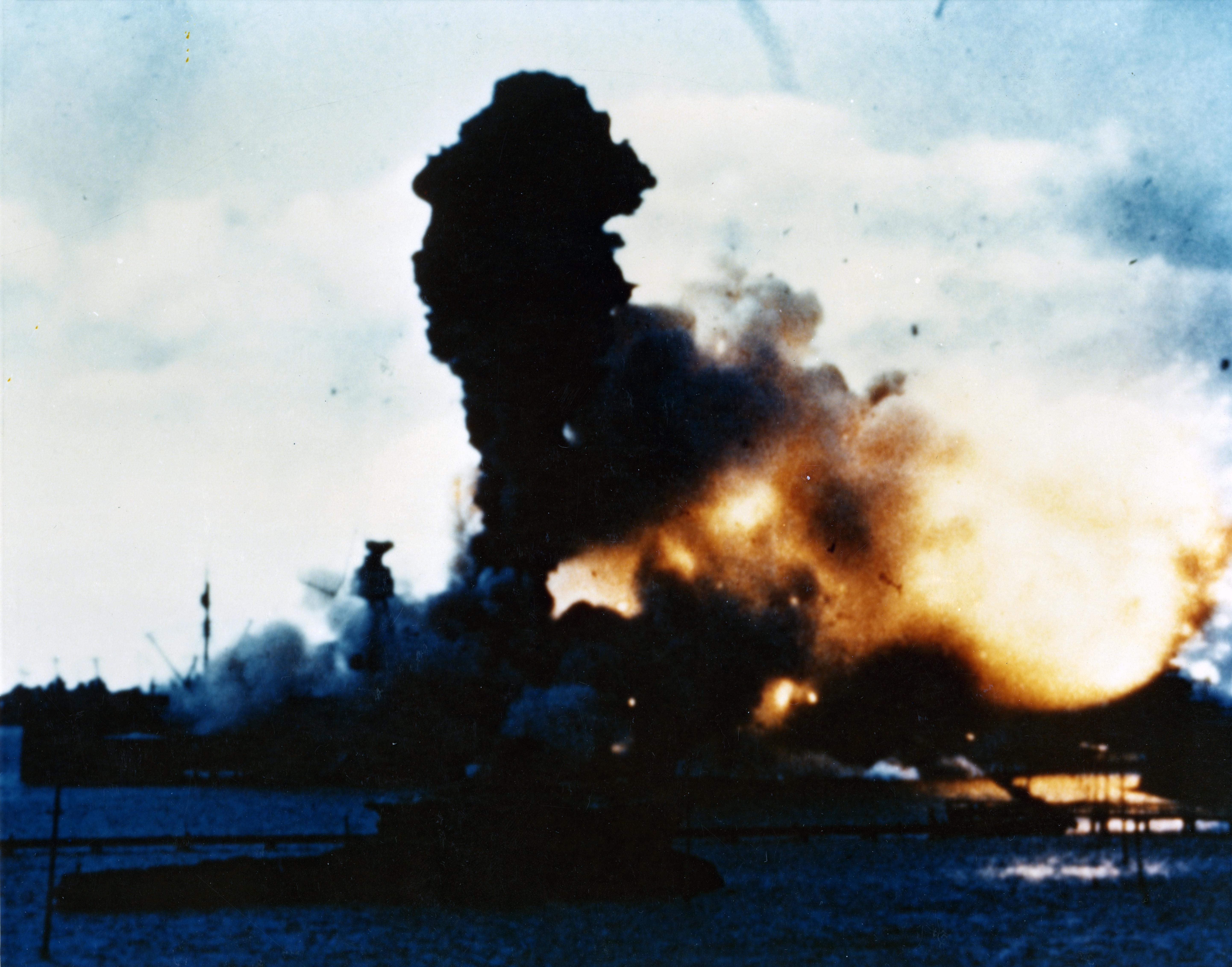 USS Arizona's forward magazines exploding during the Pearl Harbor attack, US Territory of Hawaii, shortly after 0800 hours, 7 Dec 1941, photo 1 of 2