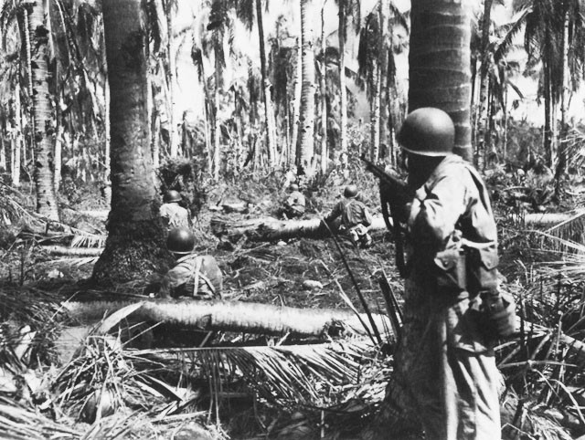 American soldiers fighting in the jungles of Leyte, Philippine Islands, late 1944
