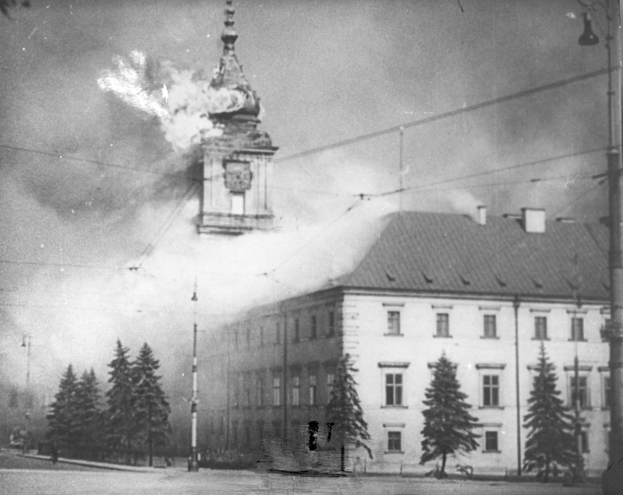 The Royal Castle in Warsaw, Poland burning after being hit by German shellfire, 17 Sep 1939
