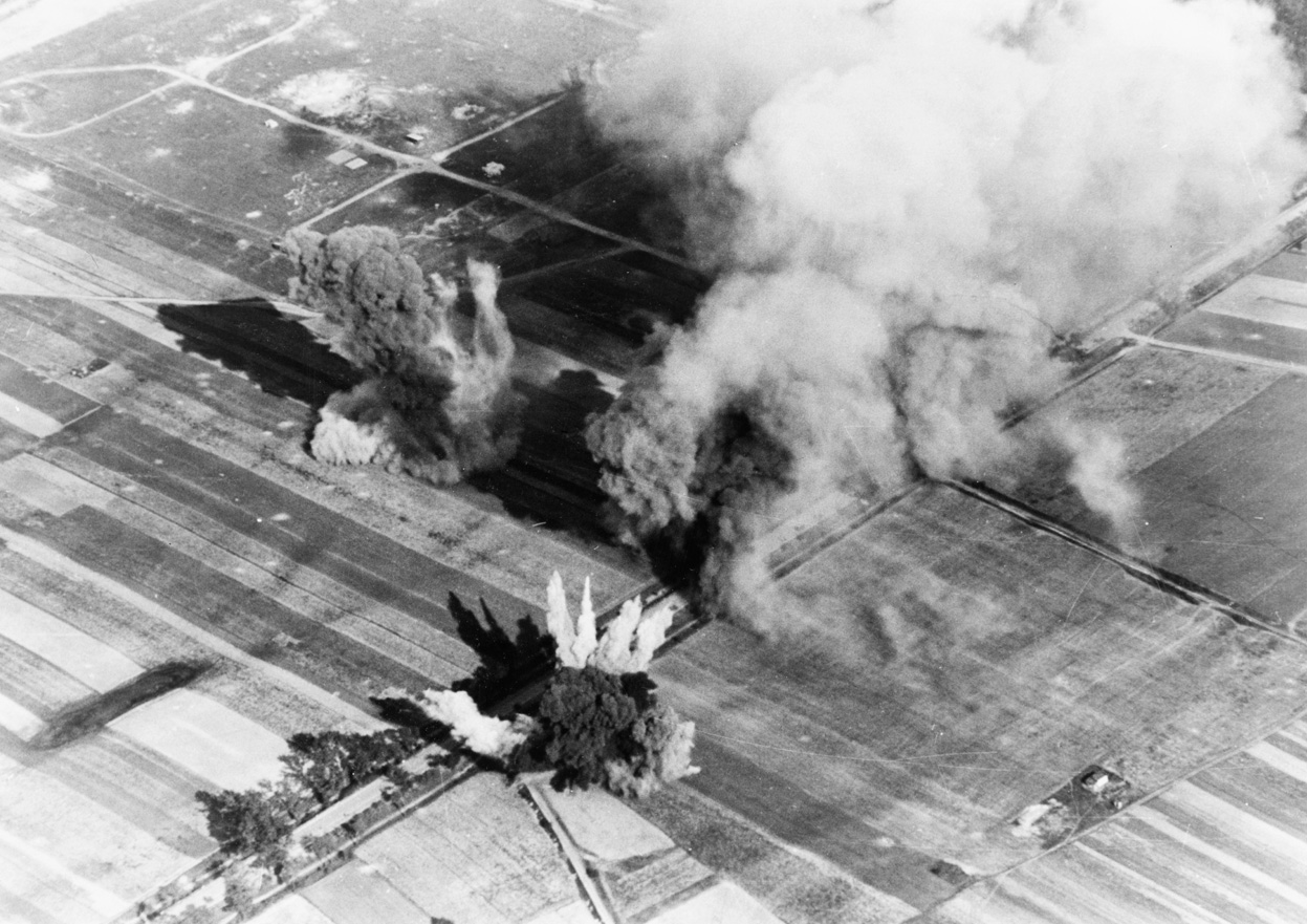 German aerial bombs straddling a road in Poland, Sep 1939
