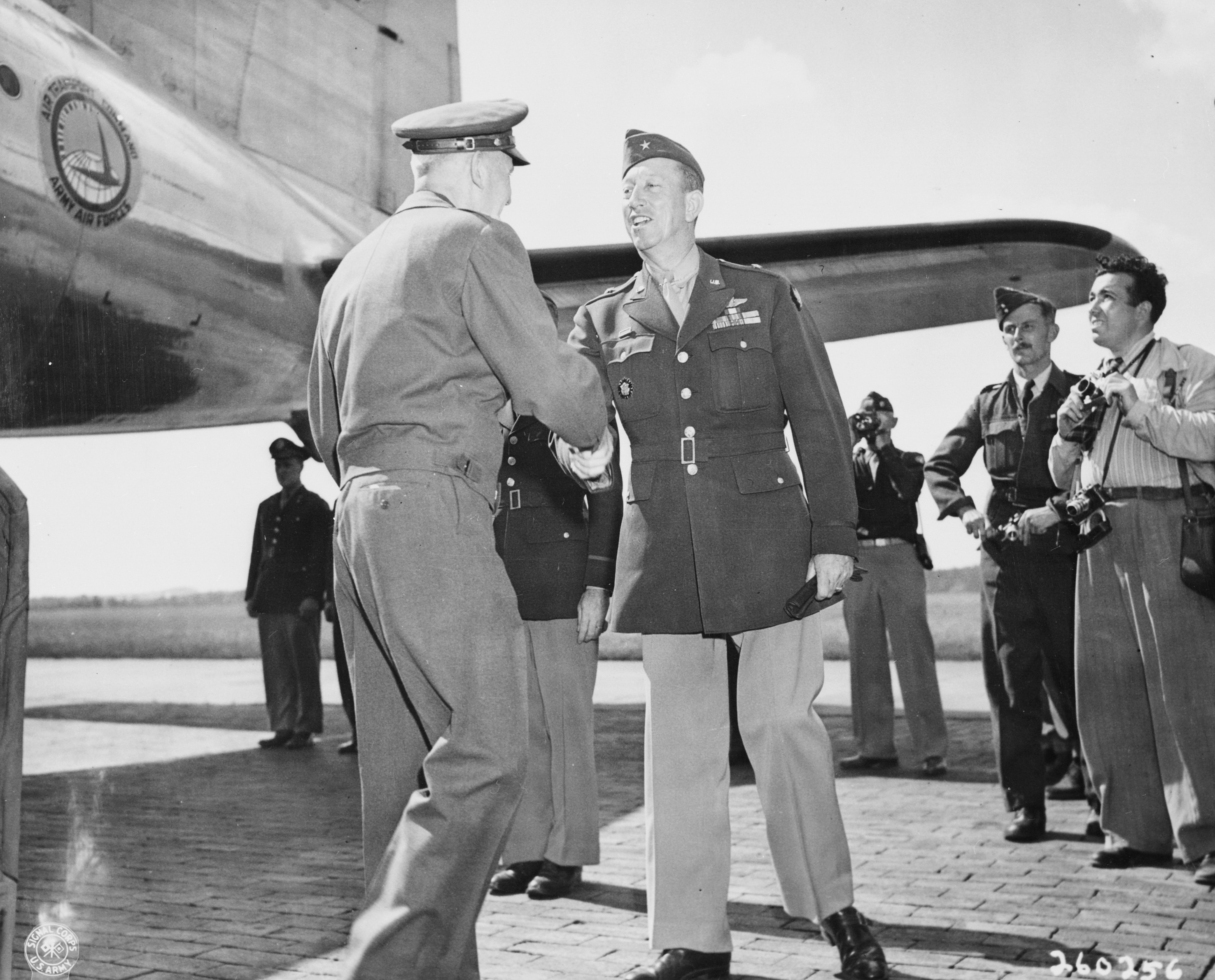 US General Brehon Somervall arriving at Berlin-Gatow airfield, Germany, 15 Jul 1945, photo 1 of 3; note Brigadier General Earl Hoag present to greet Somervall