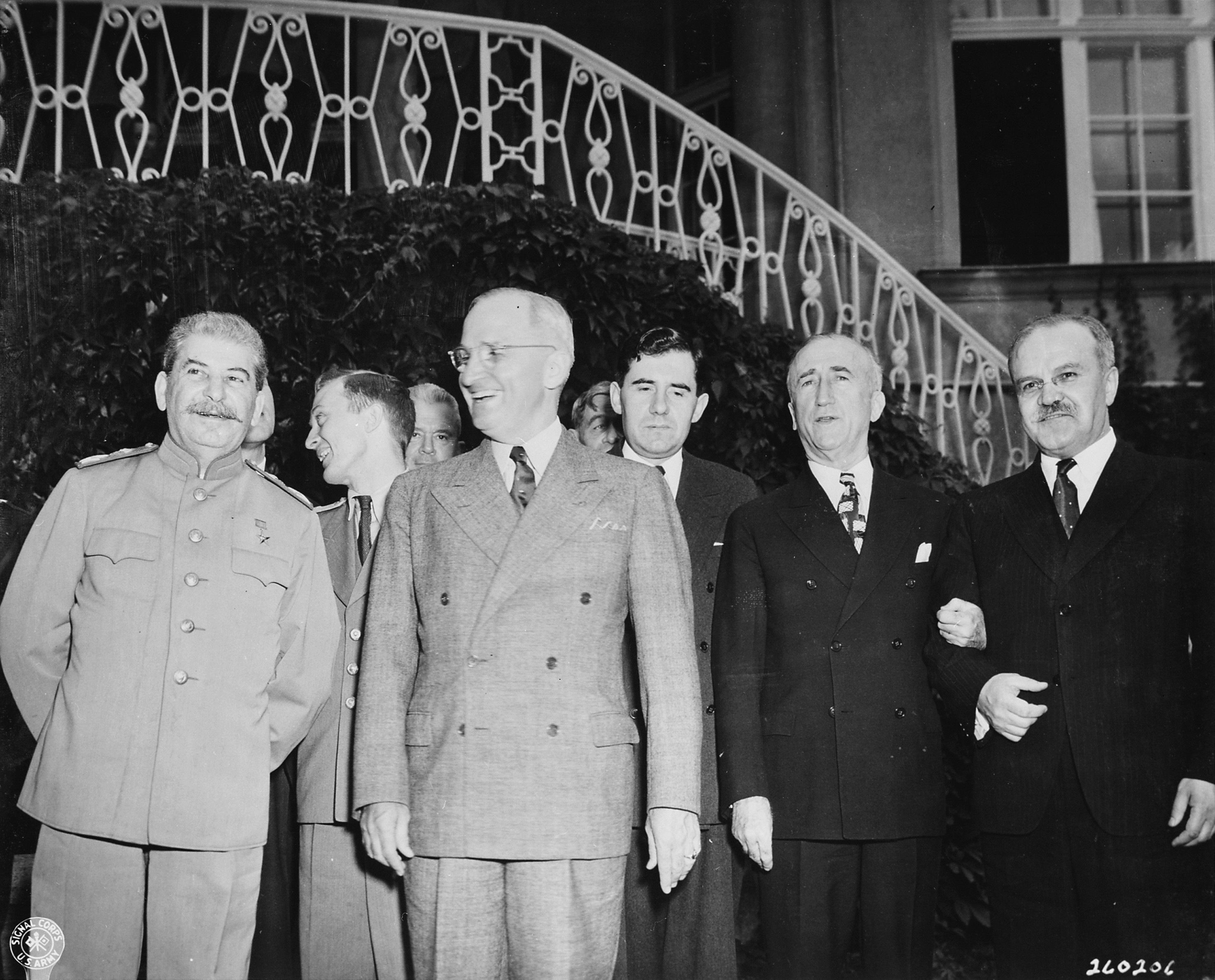 Joseph Stalin, Harry Truman, James Byrnes, and Vyacheslav Molotov at Stalin's residence during the Potsdam Conference, 18 Jul 1945, photo 1 of 2