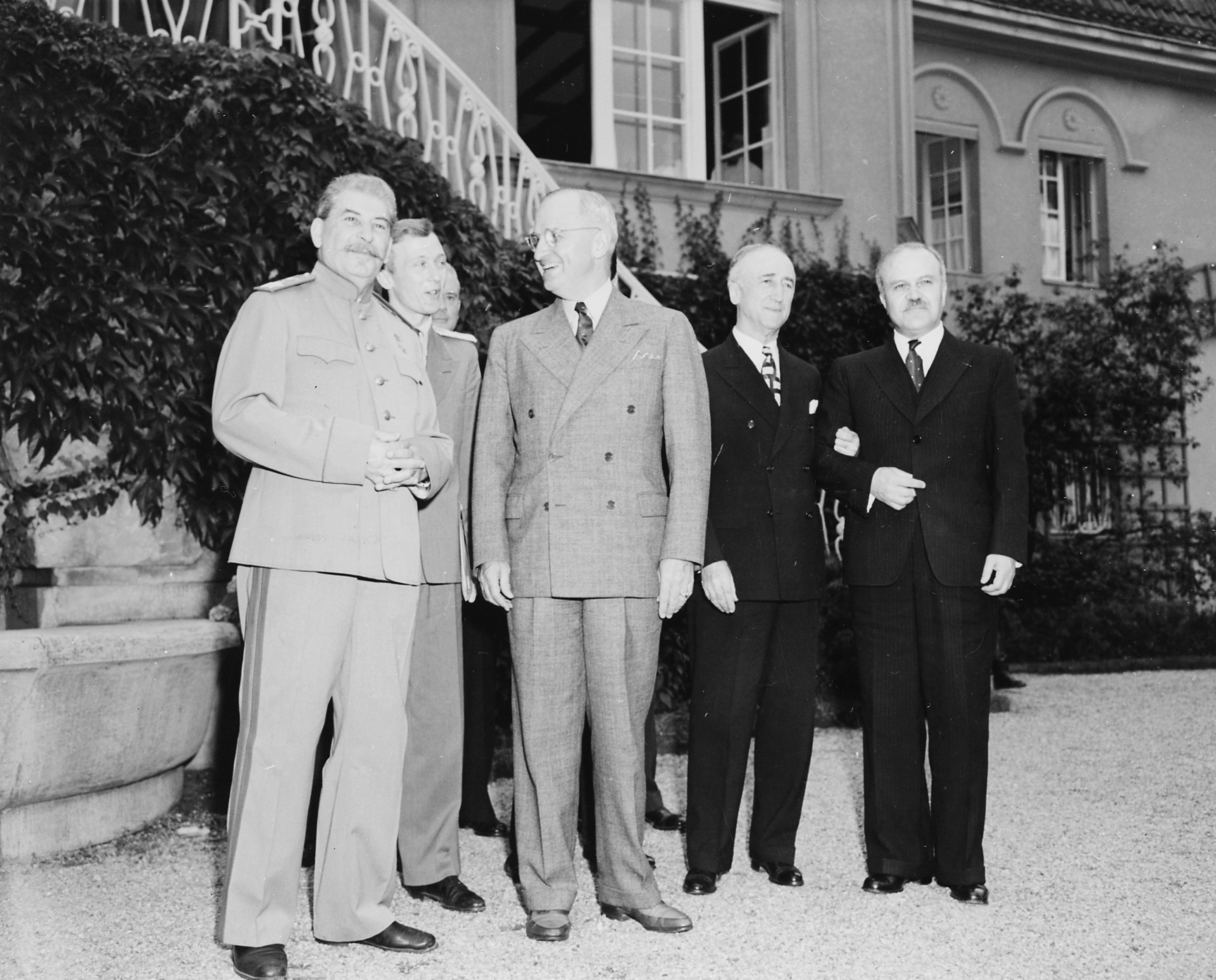 Joseph Stalin, Harry Truman, James Byrnes, and Vyacheslav Molotov at Stalin's residence during the Potsdam Conference, 18 Jul 1945, photo 2 of 2