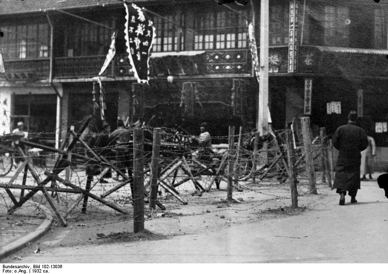 Barbed wire protecting the Shanghai International Settlement during the First Battle of Shanghai, China, 1932