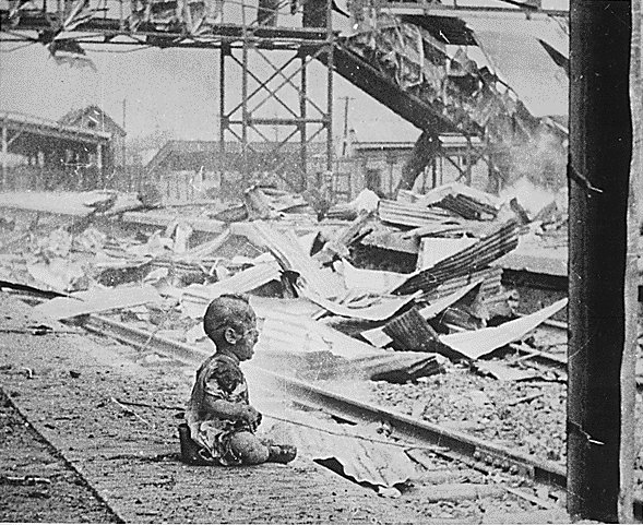 Injured Chinese toddler crying in the South Station in Shanghai, China, 28 Aug 1937, photo 1 of 2