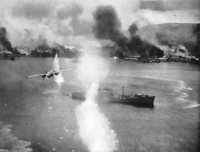 B-25 Mitchell bomber flying low above a Japanese transport during a raid on Rabaul, New Britain, circa late 1943