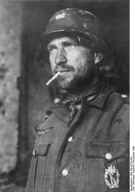 A German soldier in Stalingrad, Russia, Nov 1942; note silver badge on his chest