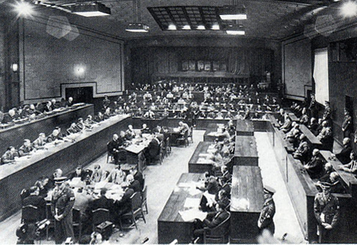 International Military Tribunal for the Far East in session, Ichigaya Court, Tokyo, Japan, 1946; judges on left, defendants on right, and prosecutors in back