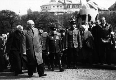 Karl Renner walking to the Parliament building, flanked by Soviet officers, Vienna, Austria, 29 Apr 1945