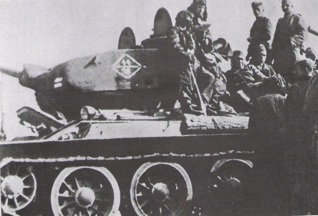 Soviet T-34 tank and crew during the Vistula-Oder Offensive, Poland or eastern Germany, Jan 1945