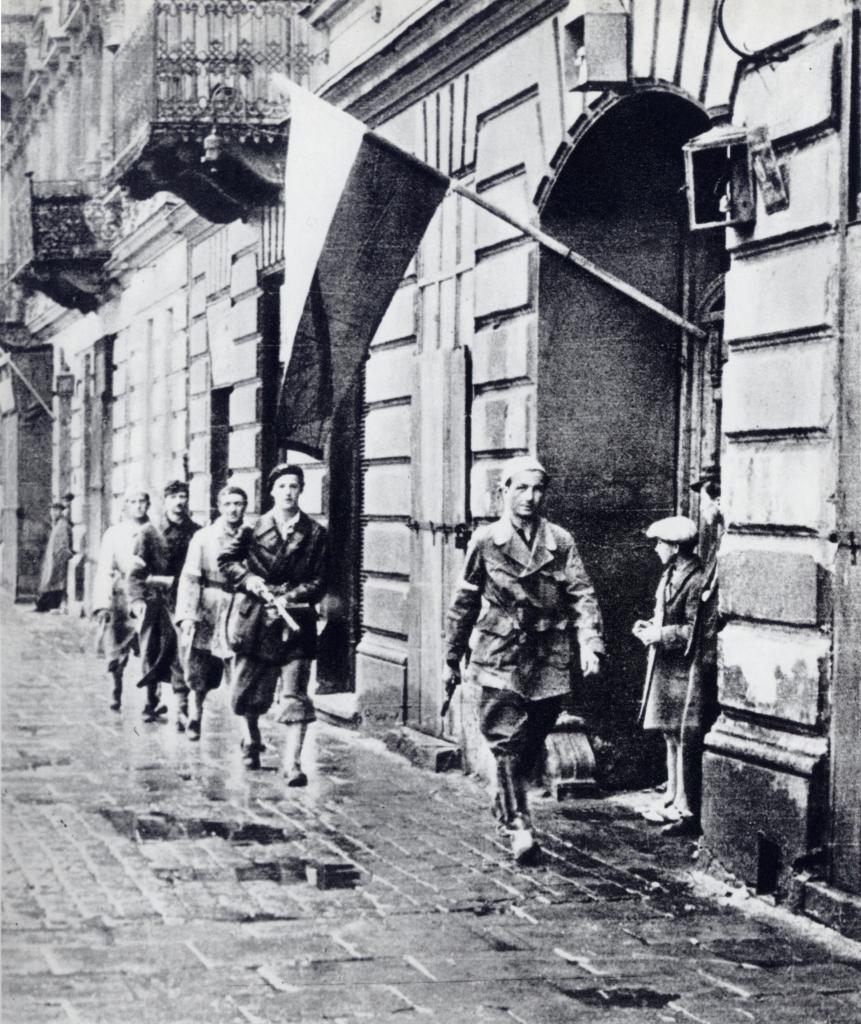 Polish insurgent fighter Lieutenant Stanislaw Jankowski and his men moments before W-hour (1700 hours) which marked the start of the Warsaw Uprising, Warsaw, Poland, 1 Aug 1944
