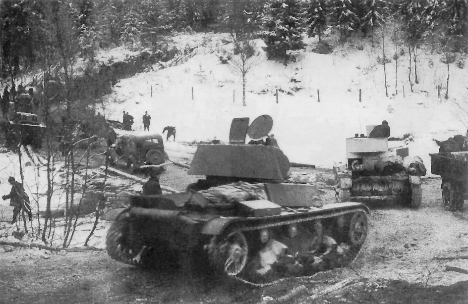 T-26 light tanks and GAZ-A trucks of Soviet 7th Army, Finland, 2 Dec 1939