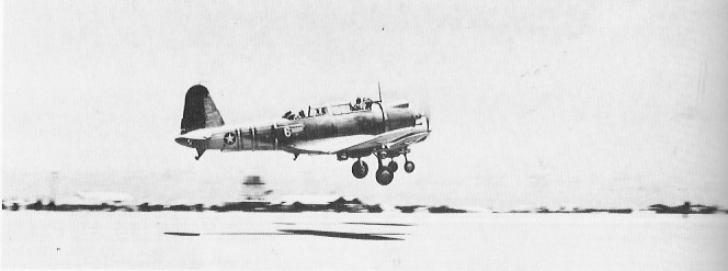 SB2U-3 Vindicator aircraft of US Marine Corps squadron VMSB-241 taking off from Eastern Island, Midway Atoll, circa late May 1942