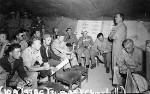 Inspecting North African bases, Winston Churchill attends a USAAF 414th Bombardment Squadron briefing at Chateau-dun-du-Rhumel Airfield, Algeria, 31 May 1943; note Brooke, Marshall, Eden