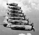 Seven TBM-3D Avengers modified for night action of VT(N)-90 flying from the carrier Enterprise, Jan 1945 Western Pacific. Photo 1 of 2