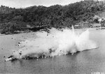 Douglas A-20G Havoc “Bevo” of the 387th Bomb Squadron disintegrates in the water after being shot down by anti-aircraft fire during an attack on Kokas, western New Guinea, 22 Jul 1944. Both crewmembers were killed. Photo 4 of 4.