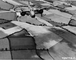 An A-20 Havoc of the 410th Bomb Group overflies a B-17 Fortress of the 381st Bomb Group over the Essex countryside, England, United Kingdom, Apr-Sep 1944