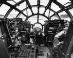 Flight deck and controls of a B-29 Superfortress. Note the security blanket over the bomb sight.