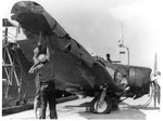 US Sailors examine wreckage of Japanese Aichi D3A “Val” dive bomber that crashed during Pearl Harbor attack, Dec 1941