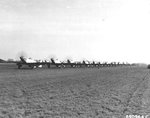Sixteen P-51D Mustangs of the 353rd Fighter Group lined up for a mission, RAF Raydon, Suffolk, England, UK, Dec 1944