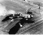 SB2C-1C Helldiver of Bombing Squadron 2 has its landing gear tangled in the arresting cables after a landing on USS Hornet (Essex-class), Mar-Sep 1944.