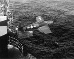 F6F-3 Hellcat of Fighting Squadron 2 being shot from the hangar deck catapult of the Fleet Carrier USS Hornet (Essex-class) during training in Chesapeake Bay, Feb 12 1944.