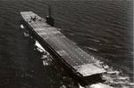 An aircraft nosed over on the flight deck of training aircraft carrier USS Sable on Lake Michigan, United States, 1944.