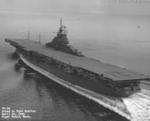 USS Ticonderoga steams down Puget Sound, Washington, United States on her trials after substantial repairs from battle damage, Apr 16, 1945. Photo 3 of 4.
