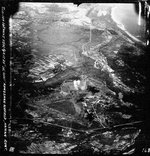 Strike photo showing bomb hits on Kiungshan Airstrip near Hoi-How (now Haikou) in northern Hainan, China, Jan 16, 1945. The bombing attack was made by Bombing Squadron 80 flying from the carrier USS Ticonderoga