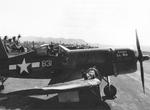 F4U Corsair ‘Luscious Lil-Nan’ of Marine Squadron VMA-21 at Orote Field, Guam, Marianas with ground crews taking advantage of a slow moment, 1944.