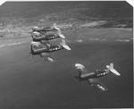FG-1D Corsairs of Marine Squadron VMF-213 assigned to Escort Carrier USS Saidor flying a training flight in Hawaii, 1945
