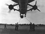 Sailors assist in grounding US Navy blimp K-11, Airship Patrol Squadron ZP-11, during a storm at NAS South Weymouth, Massachusetts, United States, Sep 27, 1942.