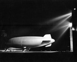 Flood lights illuminate a US Navy K-class airship of Airship Patrol Squadron ZP-33 during night operations at NAS Tillamook, Oregon, United States, 1943-44.