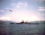 USS Missouri resting at anchor in the Gulf of Paria off Port of Spain, Trinidad during her shakedown cruise, Aug 26, 1944. Note K-class airship overhead.