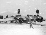 US Navy Beech SNB Expeditor (BuNo 39967) after nosing over on a snow covered runway at NAS South Weymouth, Massachusetts, United States, Feb 8, 1945.
