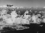 Col James Beckwith, commander of the 15th Fighter Group, in his P-51 Mustang “Squirt” leading P-51s of the 45th Fighter Squadron from their base on Saipan to their new base on Iwo Jima, Mar 7, 1945. Note the VLR tanks.