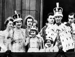 King George VI, Queen Elizabeth, and the Princesses Elizabeth and Margaret of the United Kingdom appear on the balcony of Buckingham Palace on the king’s coronation day, London, England, United Kingdom, 12 May 1937