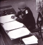 General Kuzma Nikolaivich Derevyenko signing the surrender instrument on behalf of the Soviet Union aboard USS Missouri, Tokyo Bay, Japan, 2 Sep 1945, photo 2 of 2